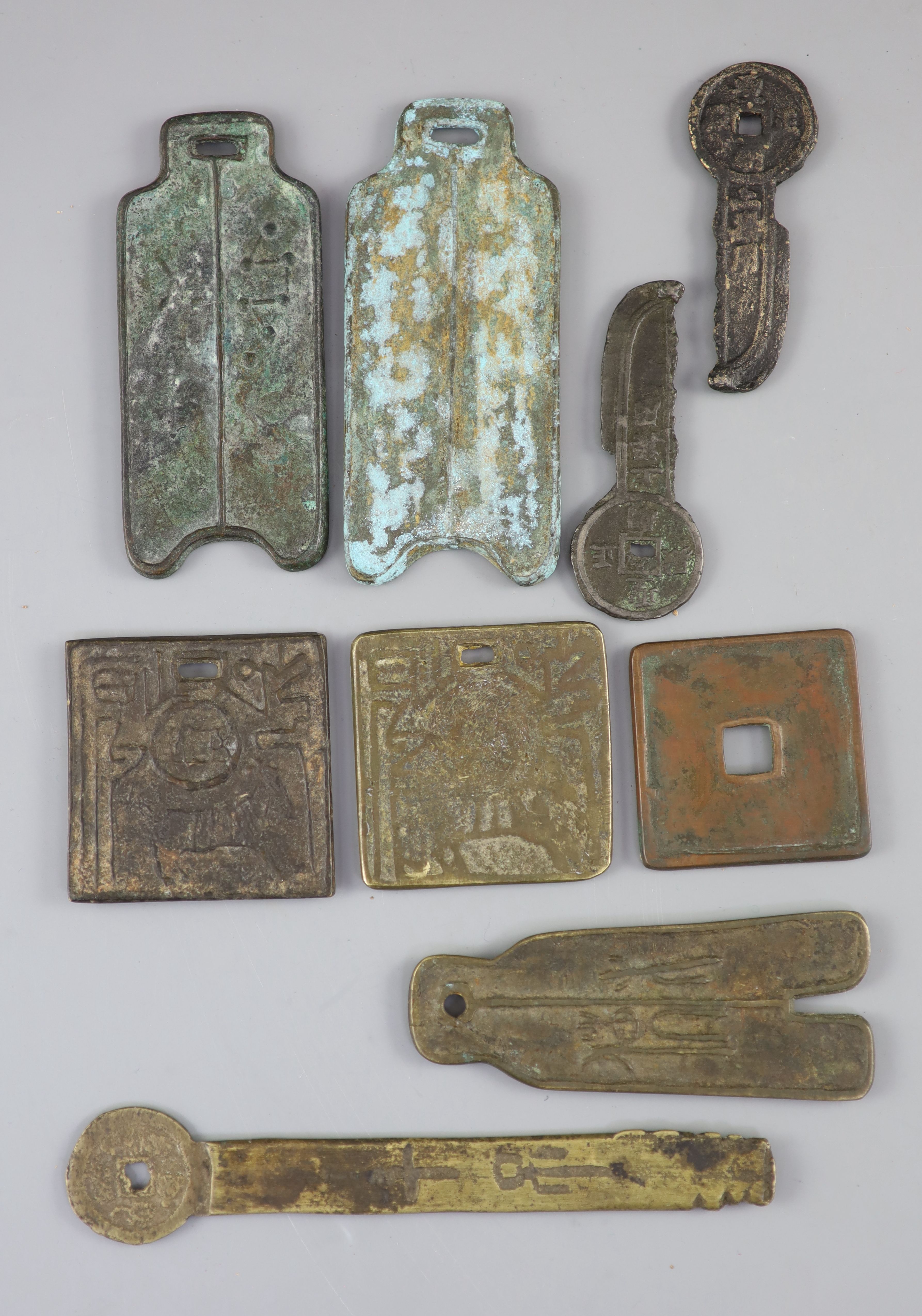 China, 9 large bronze charms or amulets, Qing dynasty-20th century